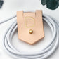 Personalized Veg Tan leather charger cord keeper with D initial, Stud & Post closure for coiled charging cables, USB cords, device cables and compact electronics storage by Keyaiira
