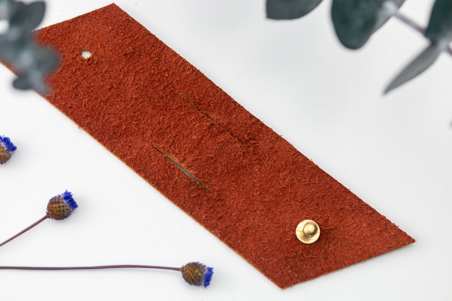Cognac genuine leather cable management strap with Stud & Post hardware, handcrafted large cord keeper for computer cables, power cords, chargers and workspace organization by Keyaiira

