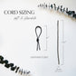 Leather Napkin Tie sizing guide from Keyaiira. Shows soft, flexible leather cord dimensions: 15 inches long and 2mm wide. Each sustainable byproduct leather cord is cut and finished by hand for modern table styling.