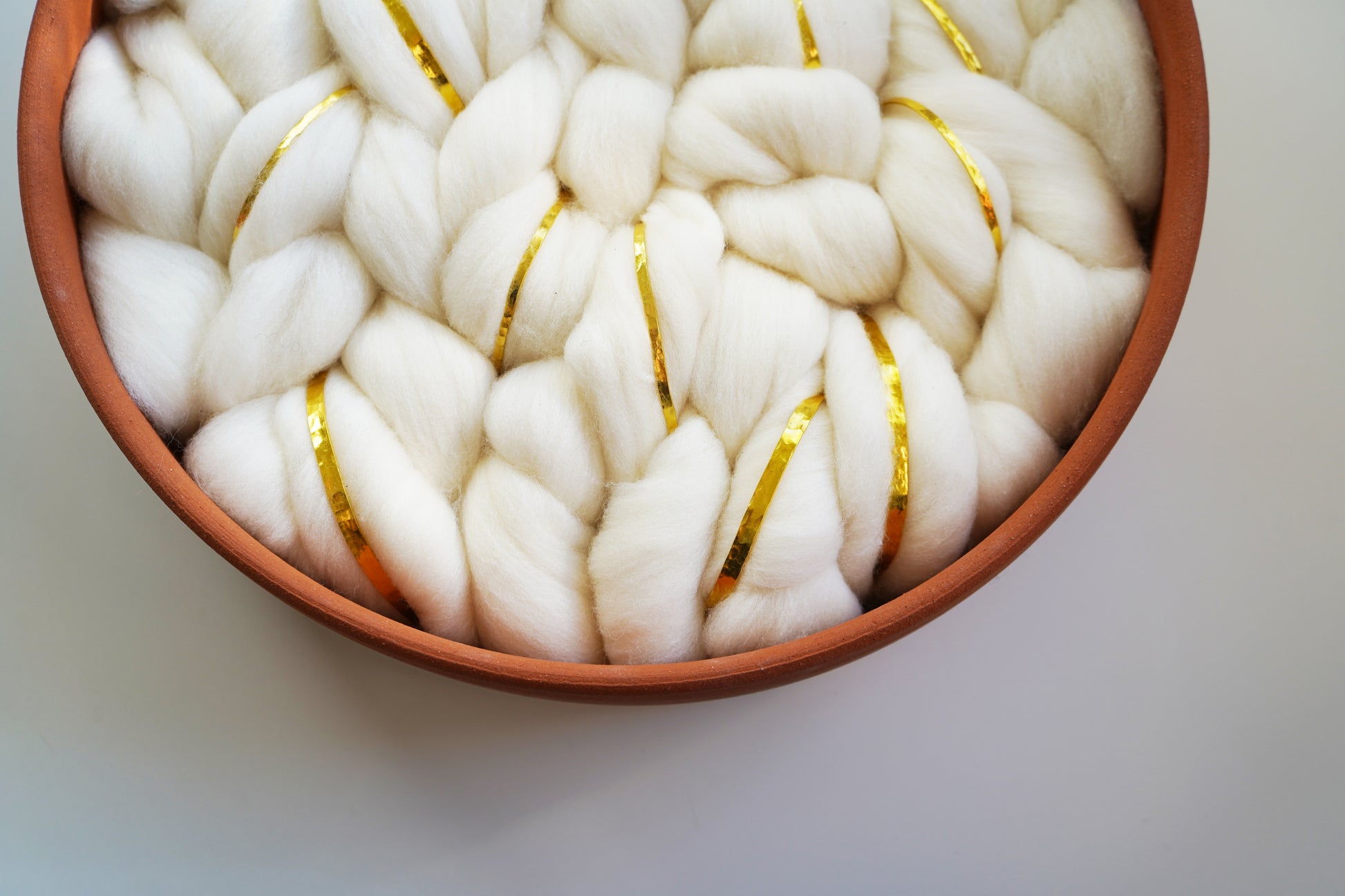 woven wall sculpture showing 3-inch deep ceramic frame. Dimensional woven wall art suitable for entryway or living room gallery walls. Modern bohemian style.