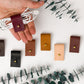Small leather cord wraps in a range of Keyaiira colors, hand-finished organizers for headphones, charging wires, electronic accessories and convenient cable storage at home or on the go
