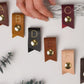 Keyaiira small leather cord holder demonstration featuring custom-lettered options, assorted genuine leather colors and snap closure design for earbuds, charging cords and cable organization

